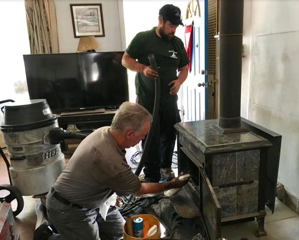 Nick and Randy Cleaning a Wood Stove